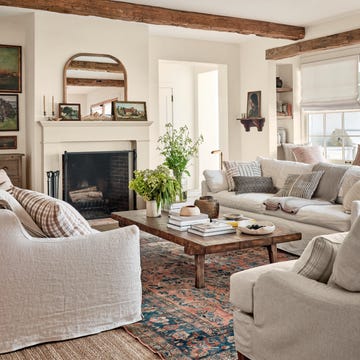 Cozy living room with rustic decor and warm tones.