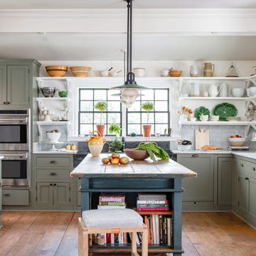 green kitchen in an 1850s maryland farmhouse with open shelves